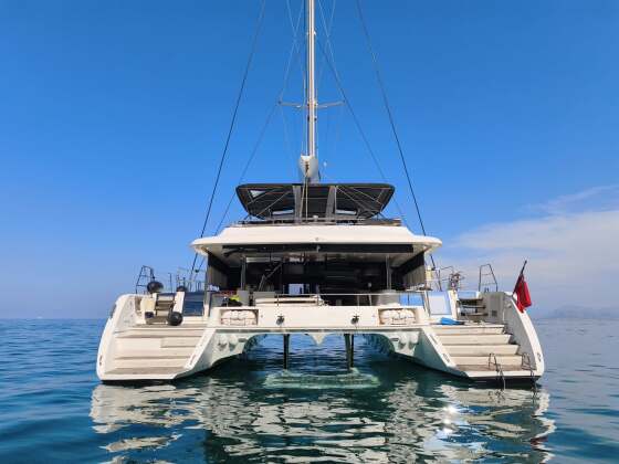 Sailing catamaran afloat after refit in Sicily – SailorOne