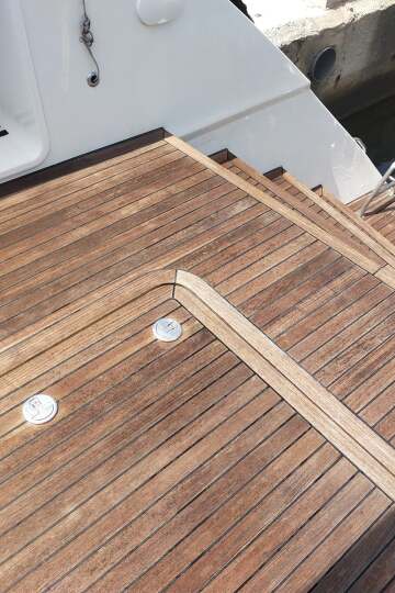 The same teak deck after restoration – SailorOne