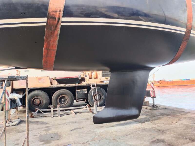 Yacht hull and keel on the hard in a boatyard in Sicily – SailorOne
